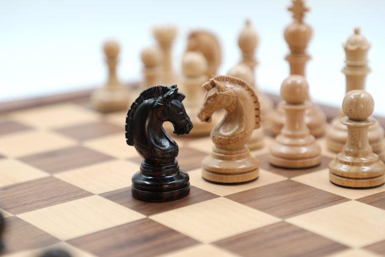 Luxury Ebony & Maple Chess Pieces with Walnut Wood Chess Board